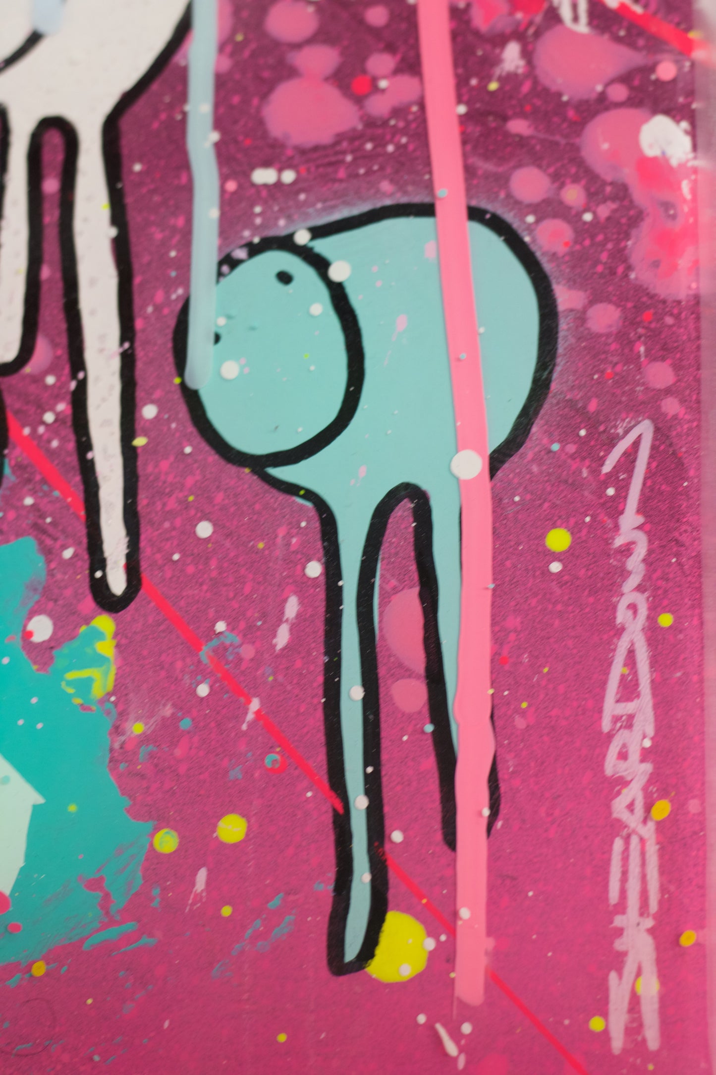 Colorful abstract cow art with splashes of pink, aqua, and yellow on a pink background with artist signature.